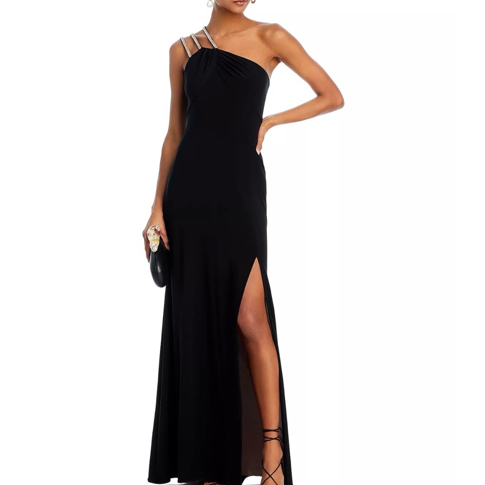 Black long dress by Aqua purchased at Bloomingdale’s. Brand new condition.
